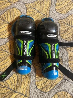 Bauer Black Hockey Shin Guards with Blue & Lime Green Accents